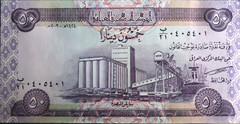 One 50 Iraqi Dinar Uncirculated CRISP Note Authentic Banknote .